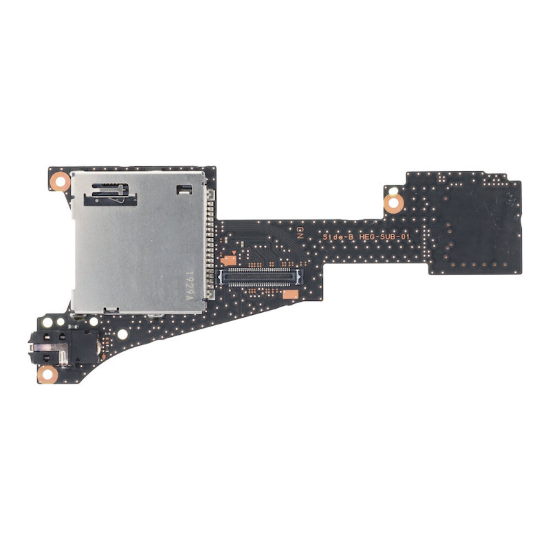 Nintendo Switch Oled, audio jack og spilkort læser